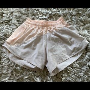 light grey/light peach lululemon hotty hot shorts